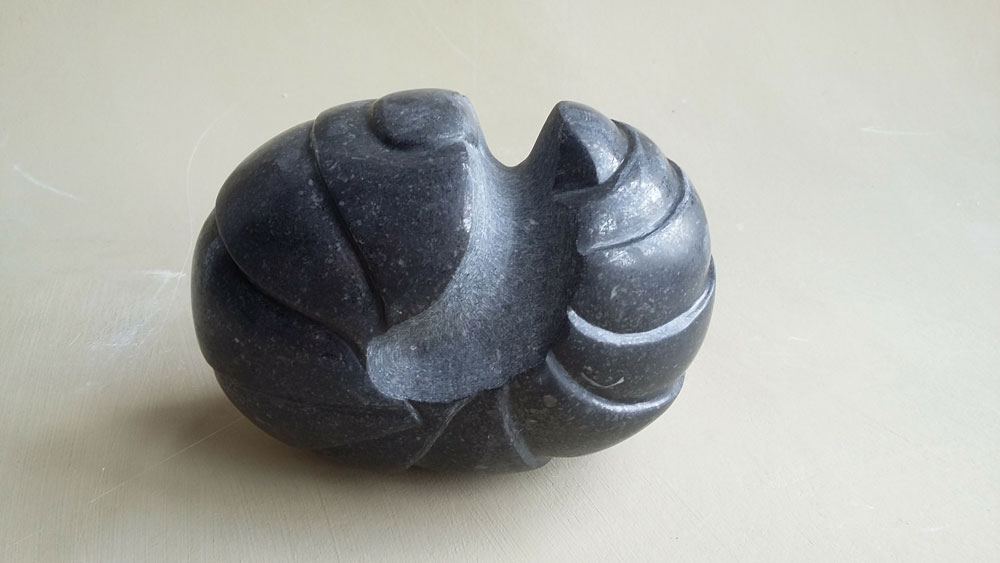 Alison Munby, Woodlouse, Kilkenny limestone 10cm x 13cm x 8cm